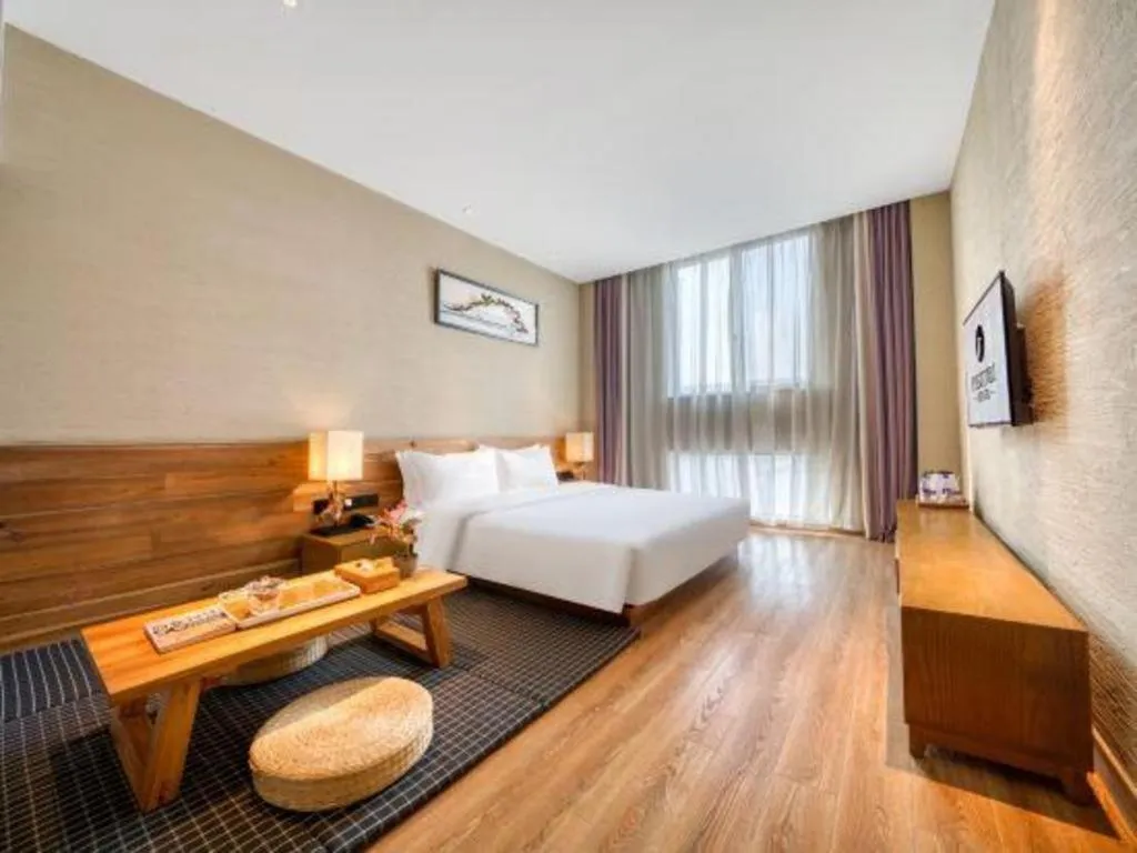 Bed in Yiqi Ecological Art Hotel Hangzhou Xixi Wetland Park Branch