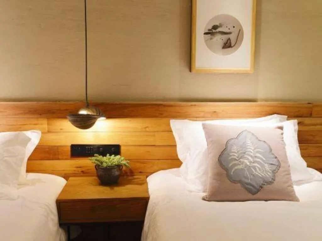 Bed in Yiqi Ecological Art Hotel Hangzhou Xixi Wetland Park Branch