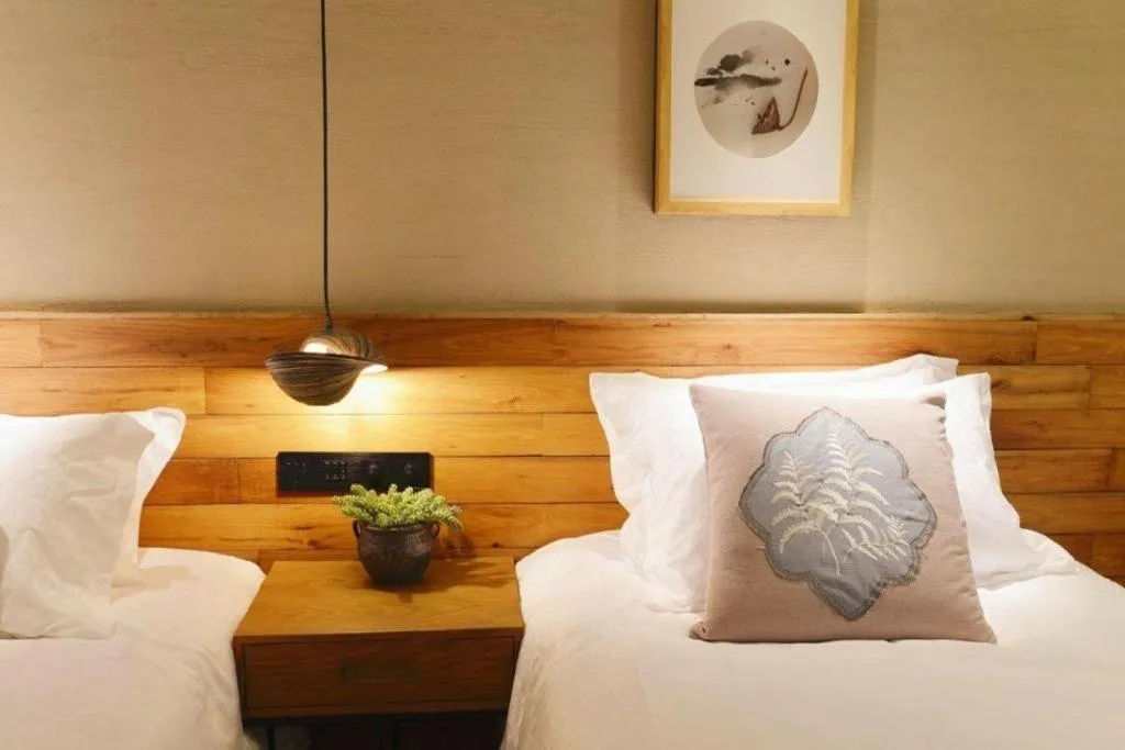 Bed in Yiqi Ecological Art Hotel Hangzhou Xixi Wetland Park Branch