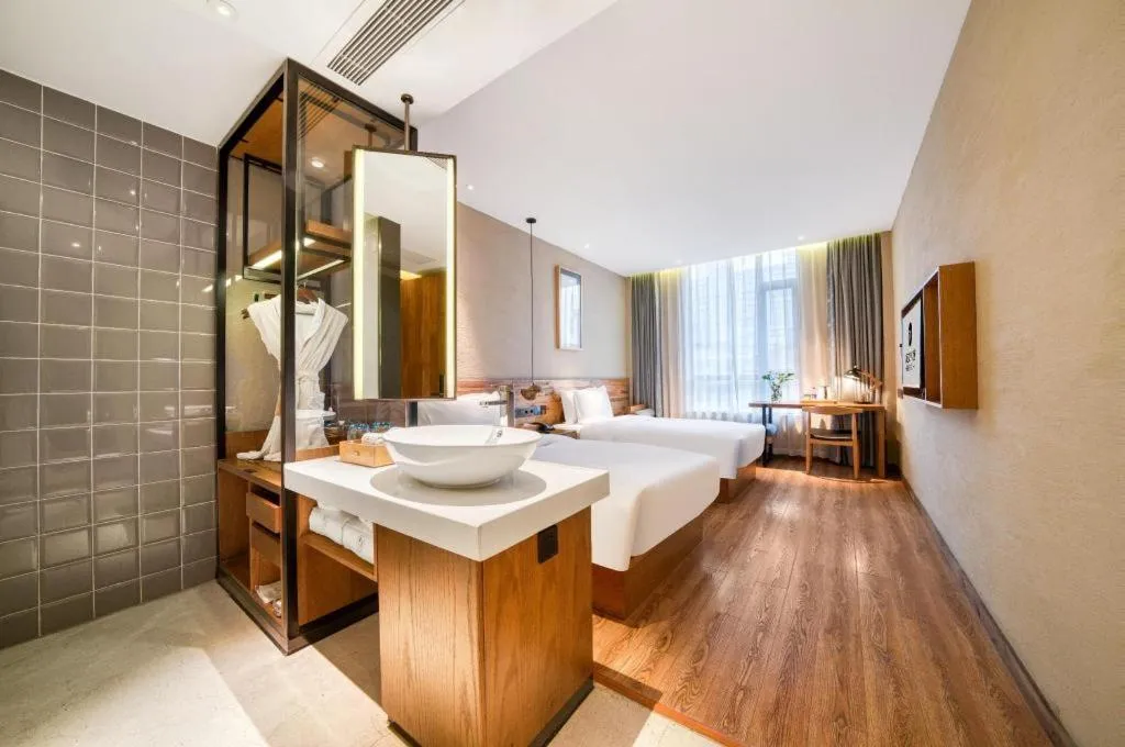 Bed in Yiqi Ecological Art Hotel Hangzhou Xixi Wetland Park Branch