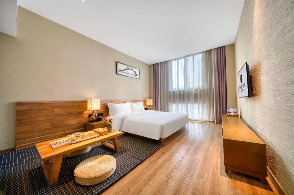 Bed in Yiqi Ecological Art Hotel Hangzhou Xixi Wetland Park Branch