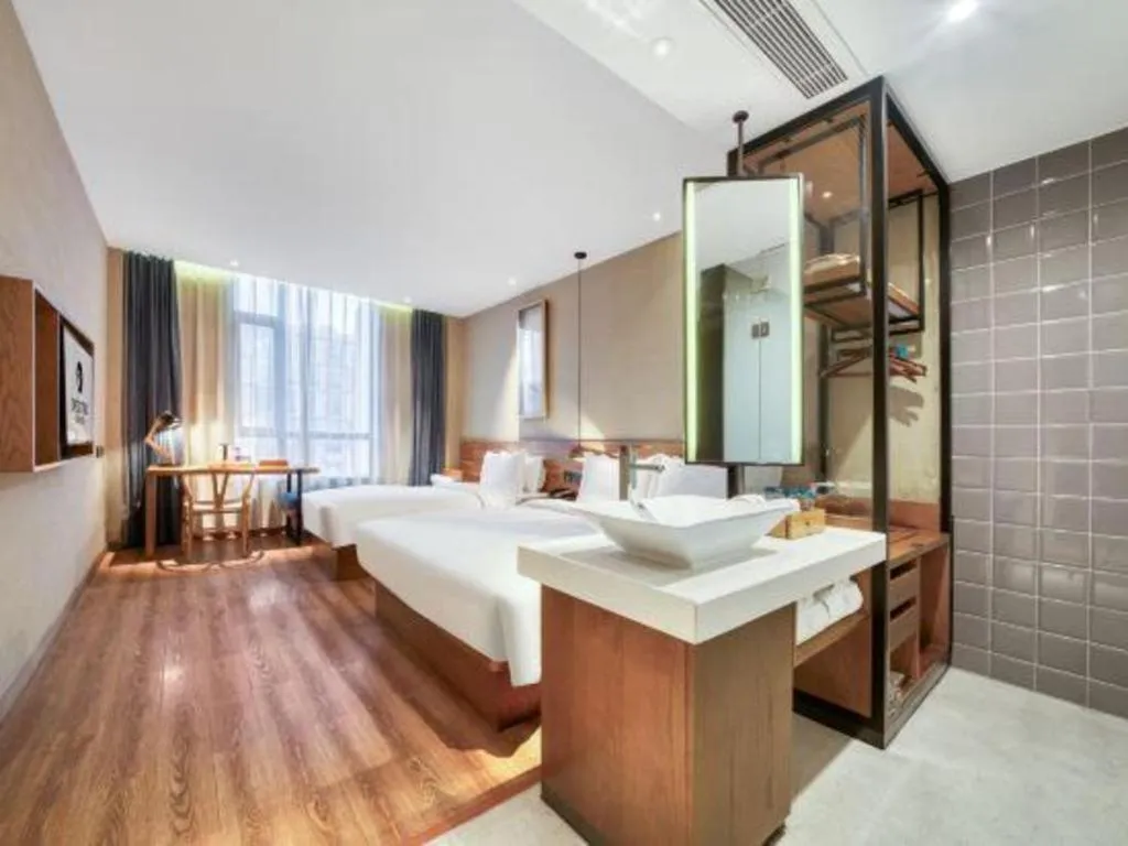 Bed in Yiqi Ecological Art Hotel Hangzhou Xixi Wetland Park Branch