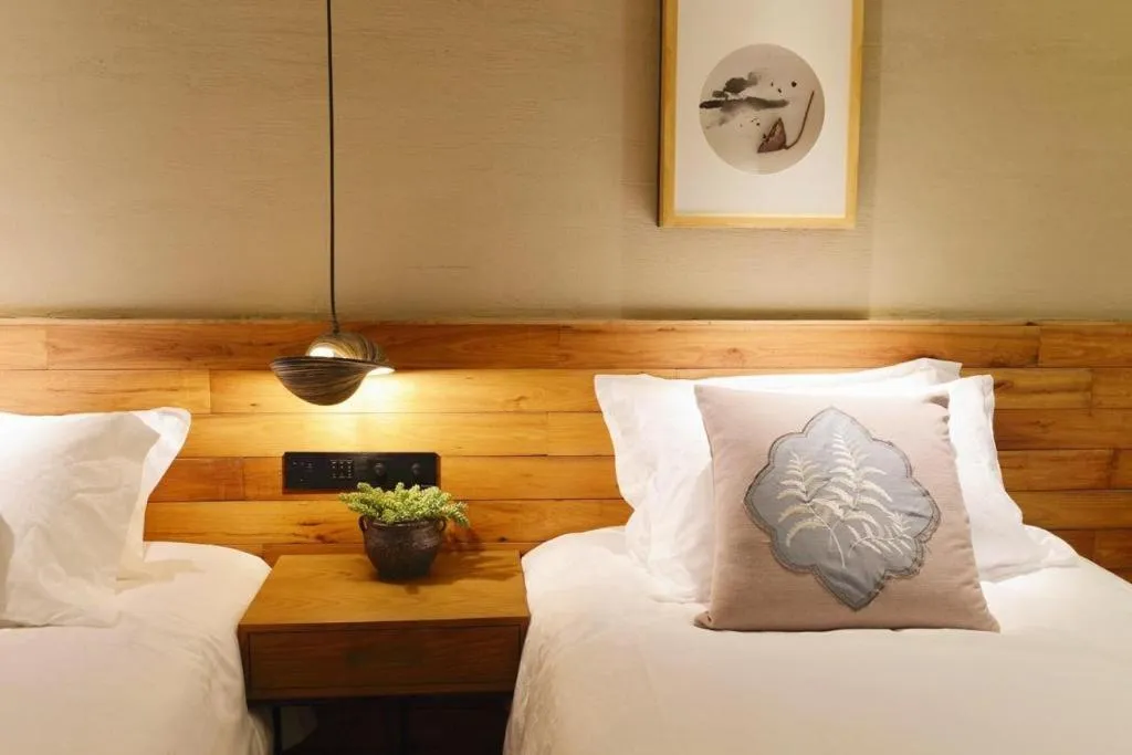 Bed in Yiqi Ecological Art Hotel Hangzhou Xixi Wetland Park Branch