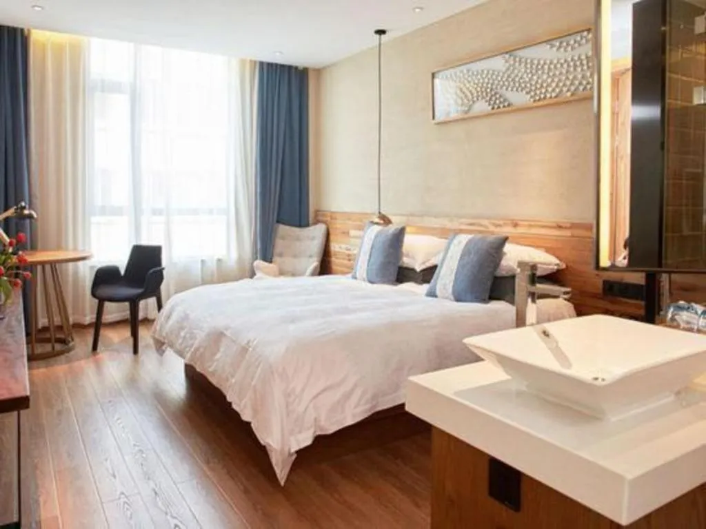 Bed in Yiqi Ecological Art Hotel Hangzhou Xixi Wetland Park Branch