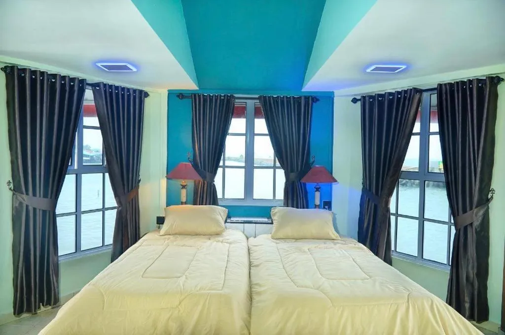 Bed in Sunset Curly Bay Hotel & Resort