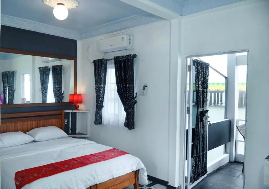 Bed in Sunset Curly Bay Hotel & Resort