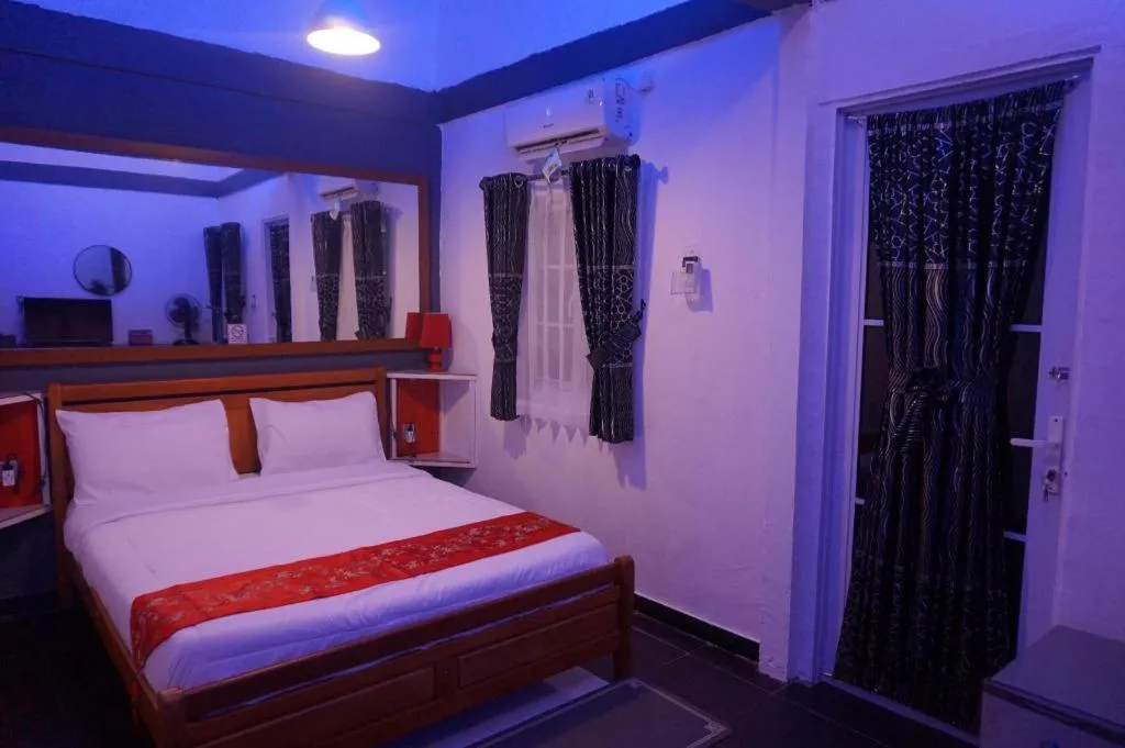 Bed in Sunset Curly Bay Hotel & Resort