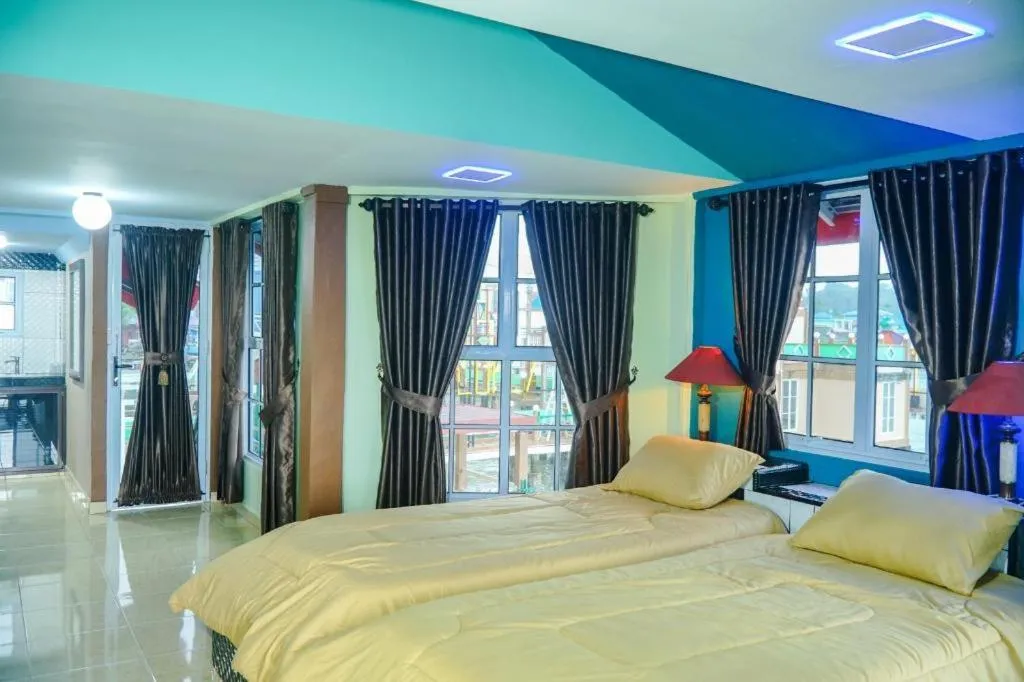 Bed in Sunset Curly Bay Hotel & Resort