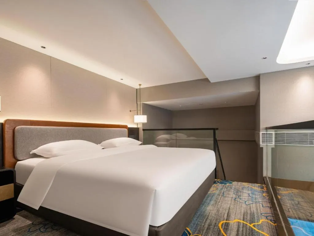 Bed in Park Inn Guangzhou Railway Station Yuexiu International Convention Center