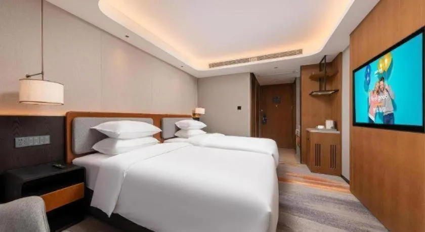 Bed in Park Inn Guangzhou Railway Station Yuexiu International Convention Center