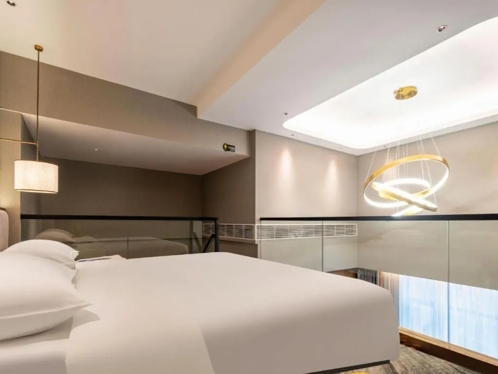 Bed in Park Inn Guangzhou Railway Station Yuexiu International Convention Center