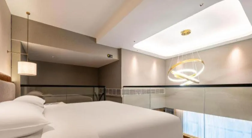 Bed in Park Inn Guangzhou Railway Station Yuexiu International Convention Center