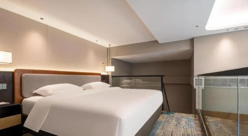 Bed in Park Inn Guangzhou Railway Station Yuexiu International Convention Center