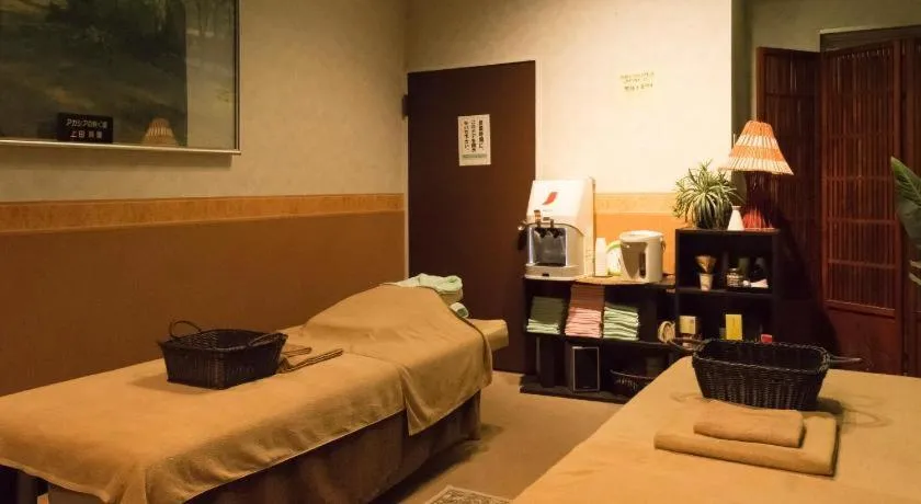 Bed in Mikuni Ocean Resort & Hotel