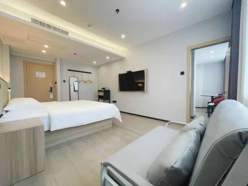 Bed in Borrman Hotel Jinhua Yiwu International Trade Mall