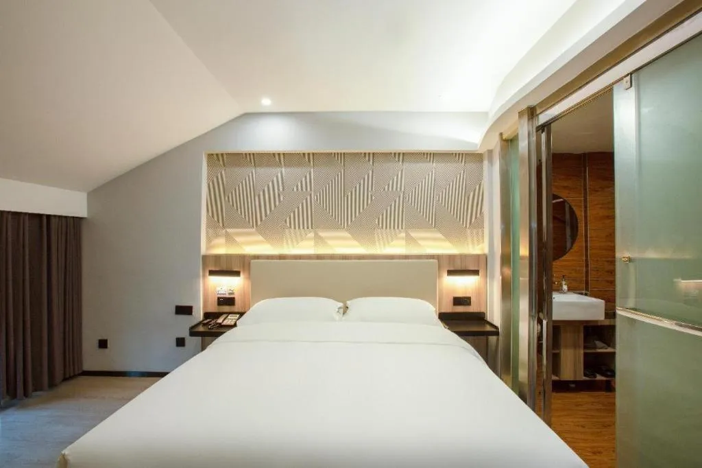 Bed in Borrman Hotel Jinhua Yiwu International Trade Mall