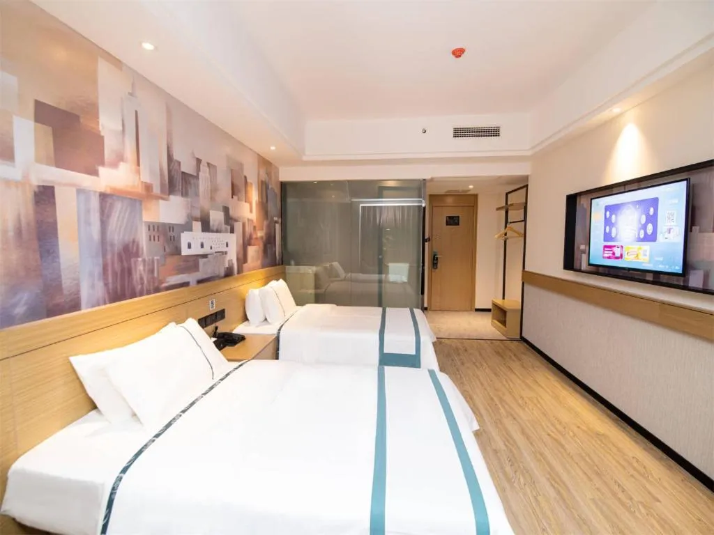 Bed in City Comfort Inn Changsha Sifangping University of National Defense Science and Technology