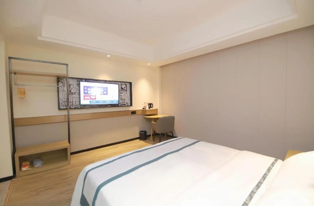 Bed in City Comfort Inn Changsha Sifangping University of National Defense Science and Technology