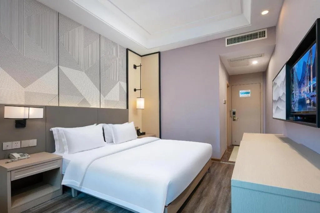 Bed in Borrman Hotel Changsha Yueliang Dao Guanziling Metro Station