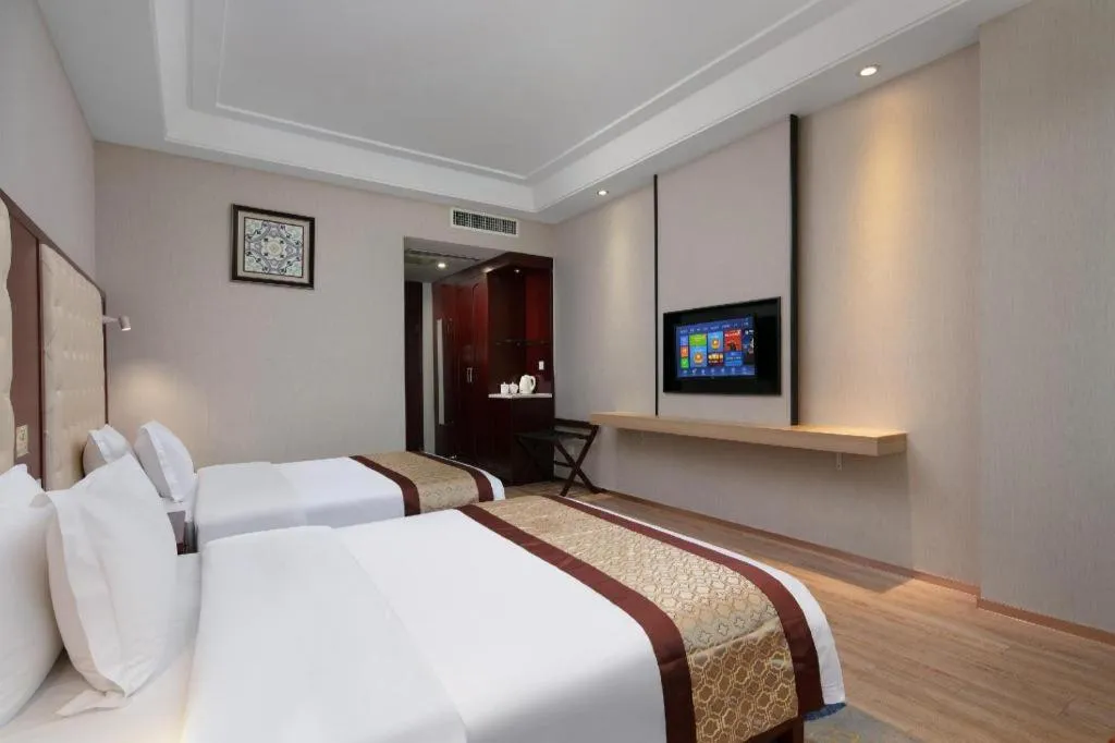 Bed in Borrman Hotel Changsha Yueliang Dao Guanziling Metro Station