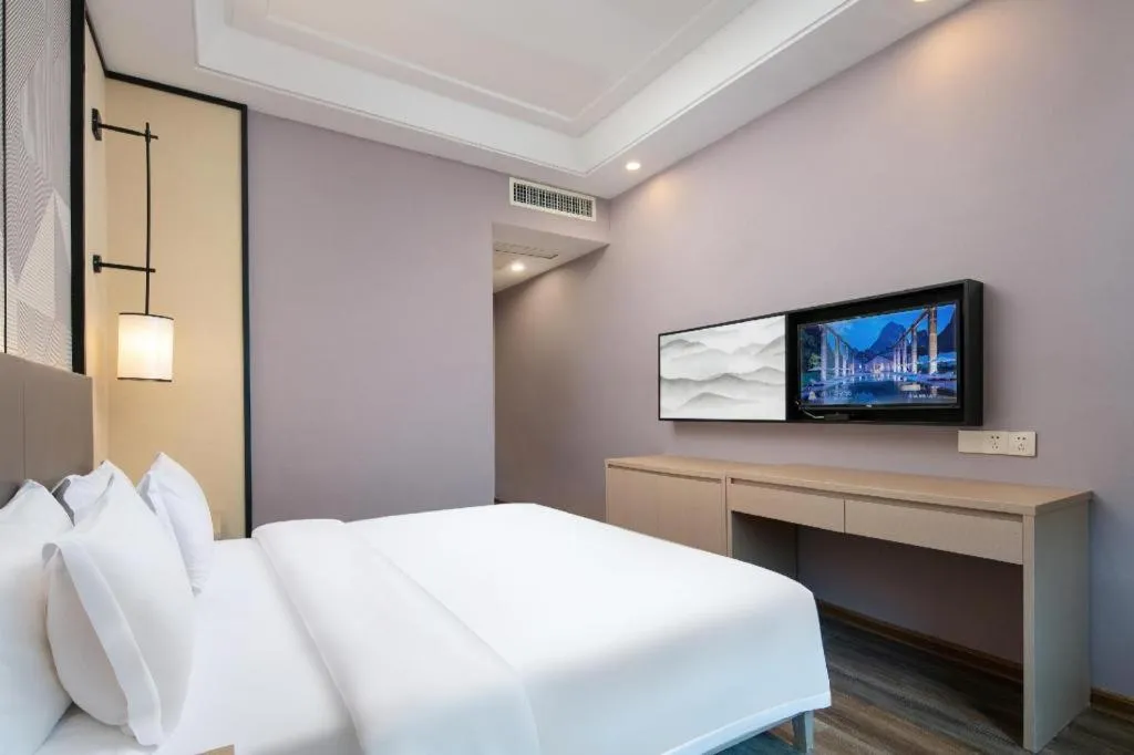 Bed in Borrman Hotel Changsha Yueliang Dao Guanziling Metro Station