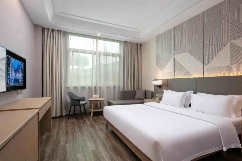 Bed in Borrman Hotel Changsha Yueliang Dao Guanziling Metro Station