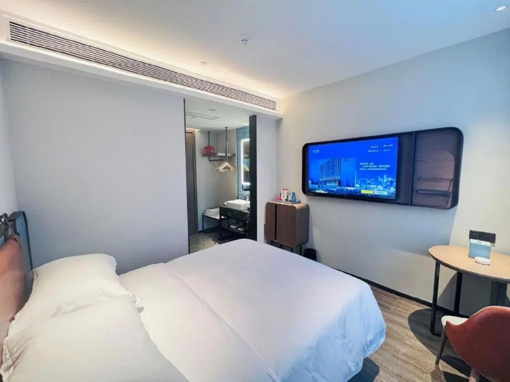 Bed in Echarm Hotel Changsha Huanghua Airport