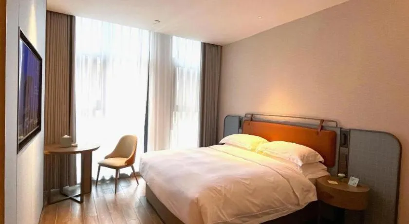 Bed in Echarm Hotel Changsha Huanghua Airport
