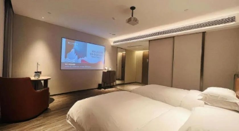 Bed in Echarm Hotel Changsha Huanghua Airport