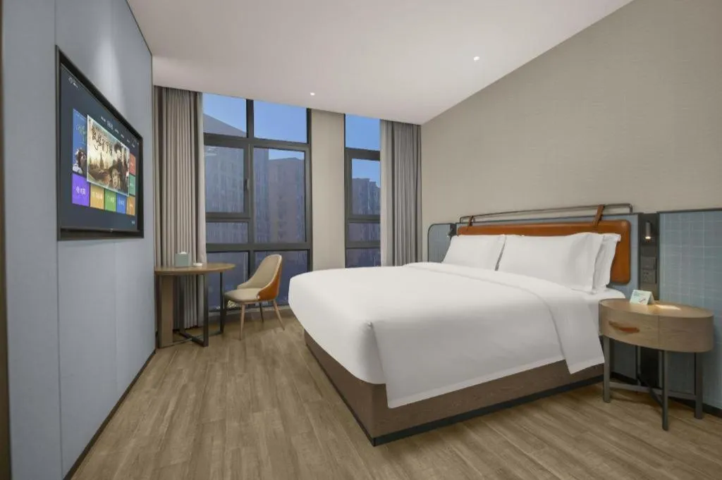 Bed in Echarm Hotel Changsha Huanghua Airport