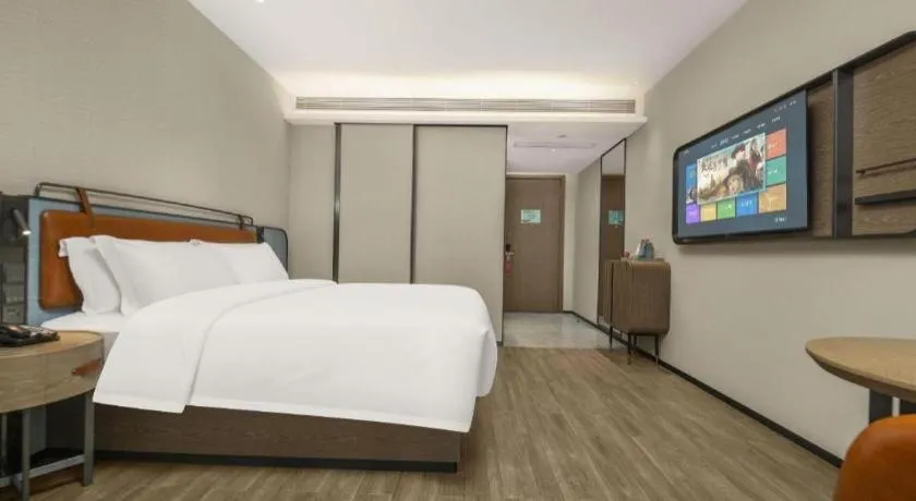 Bed in Echarm Hotel Changsha Huanghua Airport