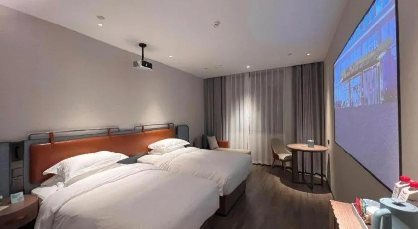 Bed in Echarm Hotel Changsha Huanghua Airport