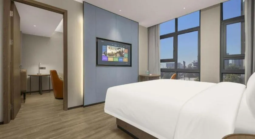 Bed in Echarm Hotel Changsha Huanghua Airport