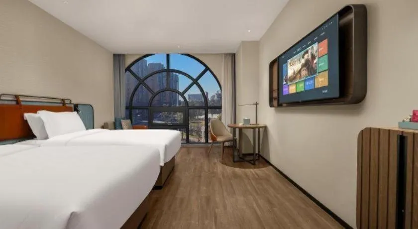 Bed in Echarm Hotel Changsha Huanghua Airport