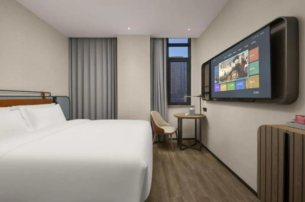 Bed in Echarm Hotel Changsha Huanghua Airport