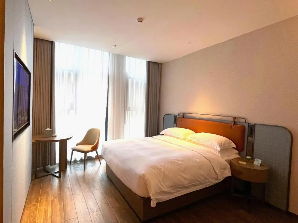 Bed in Echarm Hotel Changsha Huanghua Airport