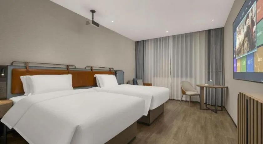 Bed in Echarm Hotel Changsha Huanghua Airport