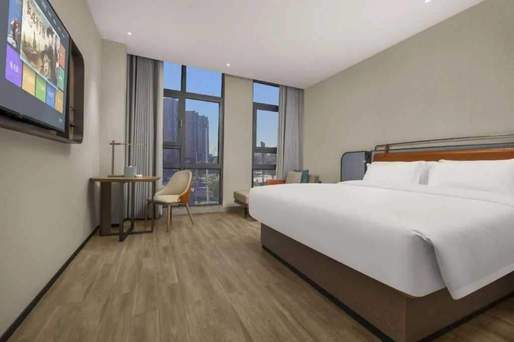 Bed in Echarm Hotel Changsha Huanghua Airport