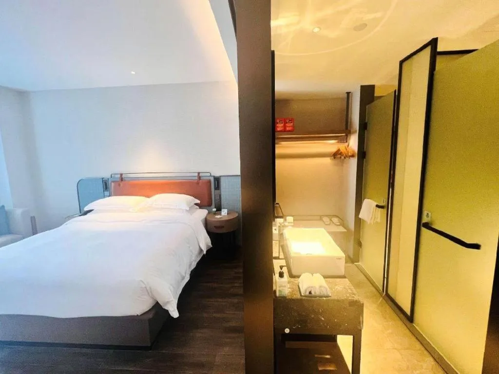 Bed in Echarm Hotel Changsha Huanghua Airport