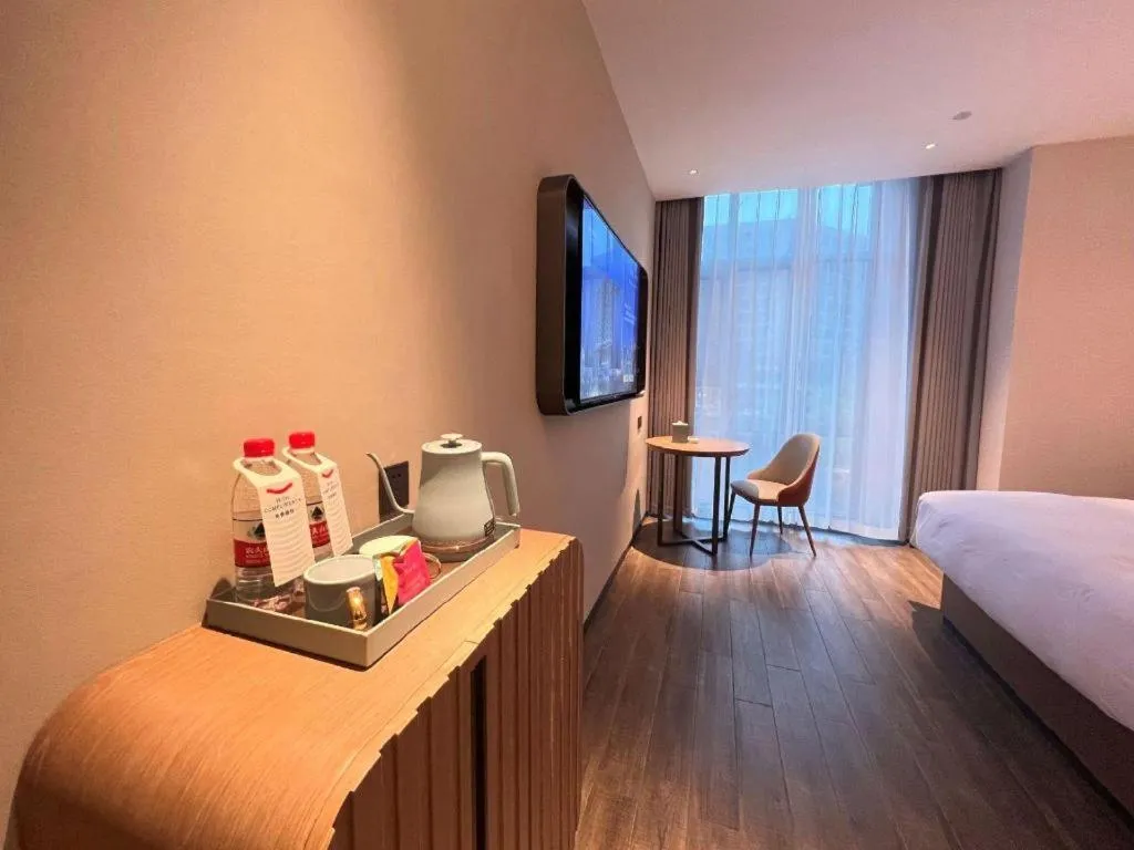 Bed in Echarm Hotel Changsha Huanghua Airport