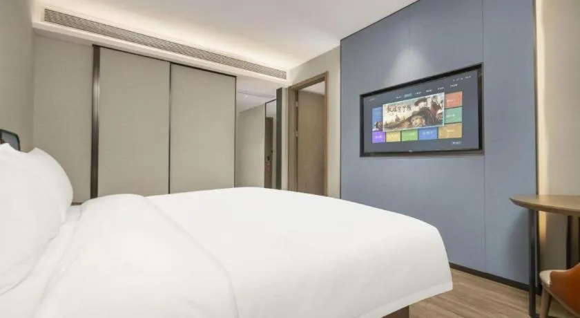 Bed in Echarm Hotel Changsha Huanghua Airport