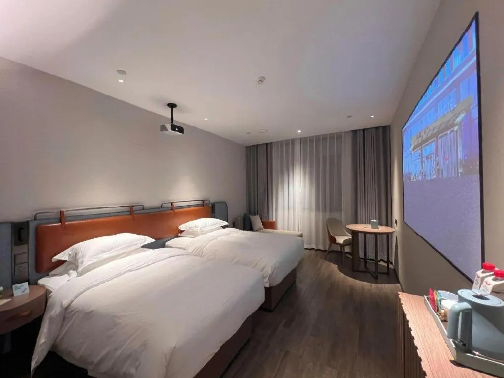 Bed in Echarm Hotel Changsha Huanghua Airport