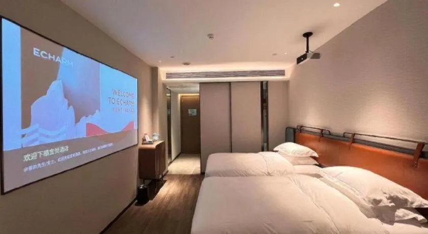 Bed in Echarm Hotel Changsha Huanghua Airport