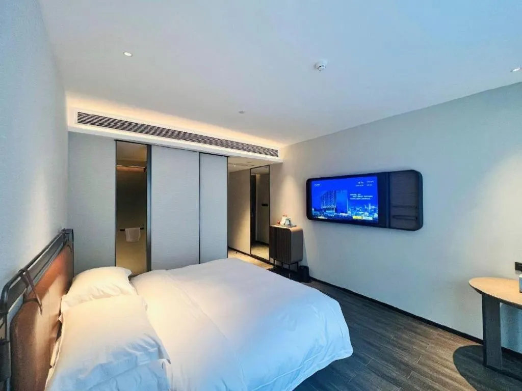 Bed in Echarm Hotel Changsha Huanghua Airport