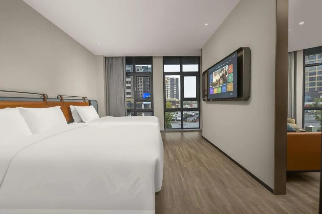 Bed in Echarm Hotel Changsha Huanghua Airport