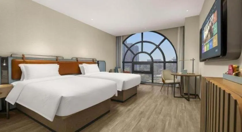 Bed in Echarm Hotel Changsha Huanghua Airport