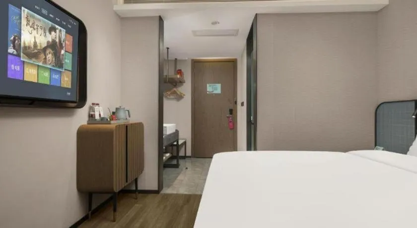 Bed in Echarm Hotel Changsha Huanghua Airport