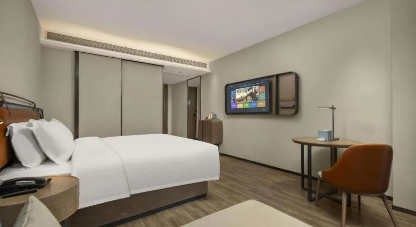 Bed in Echarm Hotel Changsha Huanghua Airport