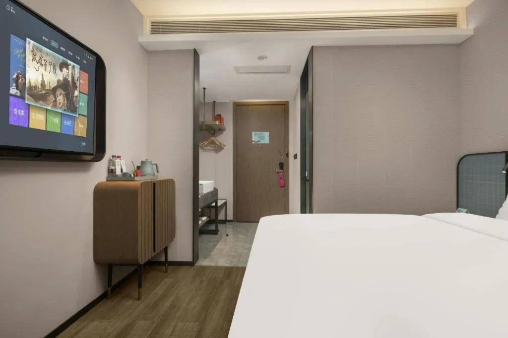 Bed in Echarm Hotel Changsha Huanghua Airport