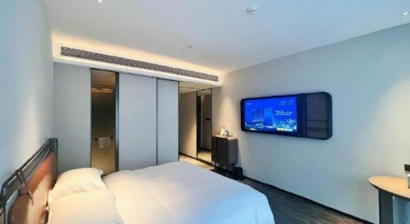 Bed in Echarm Hotel Changsha Huanghua Airport